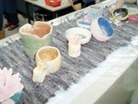 訓練員需具備多種手工藝技能，才可施予教授。圖為智障人士製作的陶藝作品。